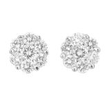 A pair of diamond cluster earrings.Estimated total diamond weight 0.20ct,