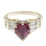 A glass-filled ruby and diamond bi-colour ring.Estimated total diamond weight 0.40ct.