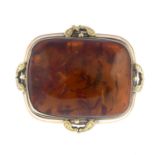 A modified amber brooch.Length 5cms.