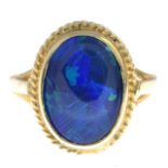 A 9ct gold synthetic opal single-stone ring.Hallmarks for 9ct gold.Ring size N.