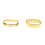 A set of 18ct gold diamond rings, comprising a single-stone ring and a band ring.