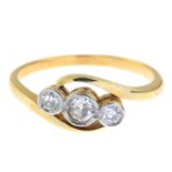 A diamond three-stone ring.Estimated total diamond weight 0.15ct,