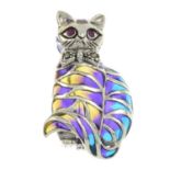 A plique-a-jour enamel cat brooch, with ruby and pyrite detail.