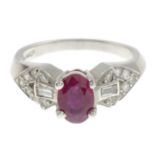 A ruby and diamond dress ring.Estimated total diamond weight 0.20ct.
