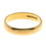 A 22ct gold band ring.Hallmarks for Sheffield, 1990.Ring size O1/2.