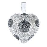 A diamond and black gem heart pendant.Stamped 585.Length 2cms.