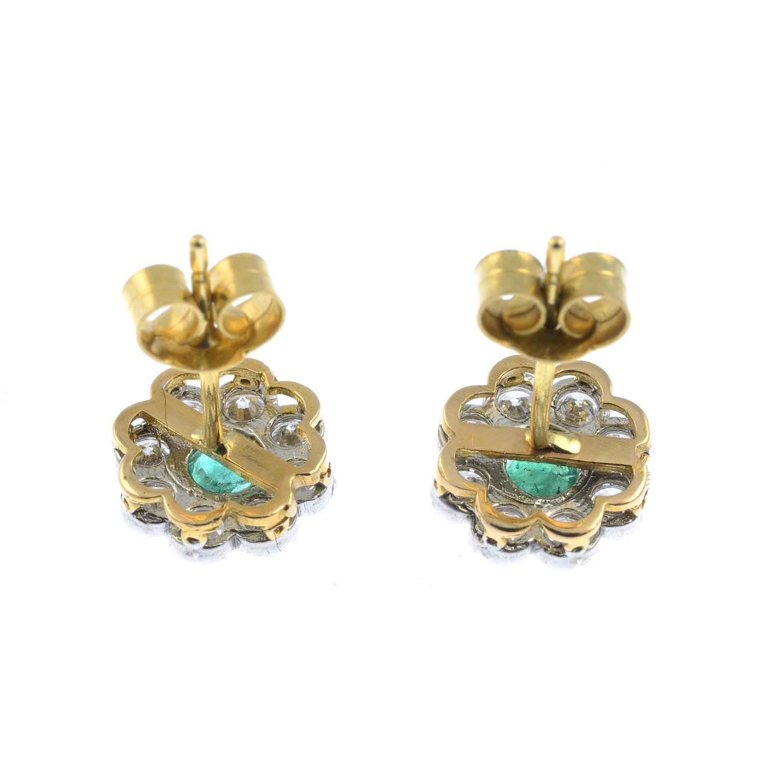 A pair of emerald and brilliant-cut diamond floral cluster earrings.Estimated total diamond weight - Image 2 of 2