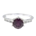 A 9ct gold amethyst and diamond ring.Estimated total diamond weight 0.10ct.Hallmarks for