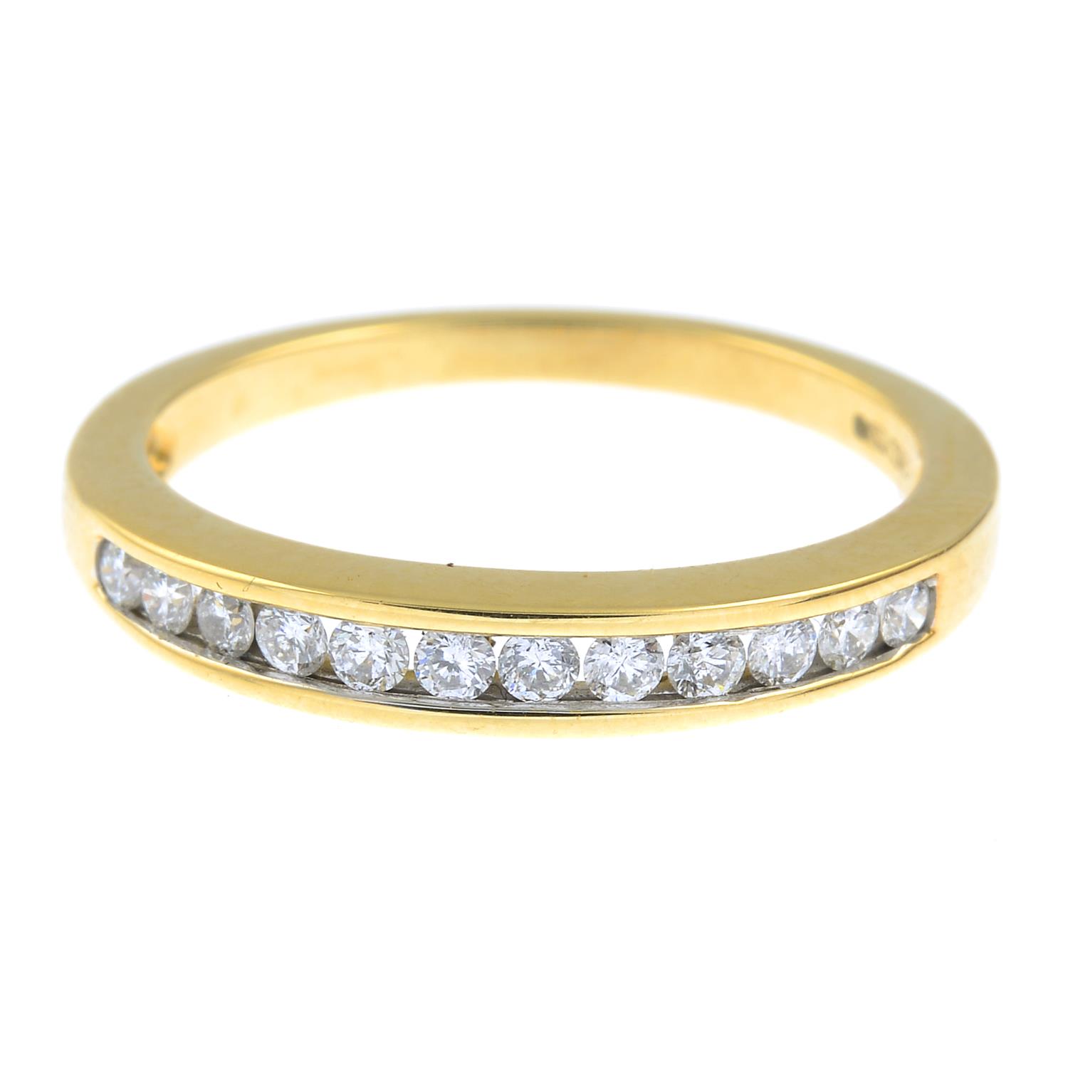 An 18ct gold diamond half eternity ring.Estimated total diamond weight 0.25ct.