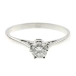 An 18ct gold diamond single-stone ring.Estimated diamond weight 0.40ct,