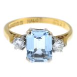 An 18ct gold aquamarine and brilliant-cut diamond three-stone ring.