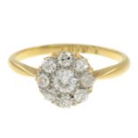 A diamond cluster ring.Estimated total diamond weight 0.45ct,