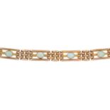 An early 20th century 9ct gold opal brick-link bracelet.