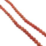 A coral bead necklace.Approximate dimensions of coral beads 3.4 by 2.8mms to 8.1 by 7mms,