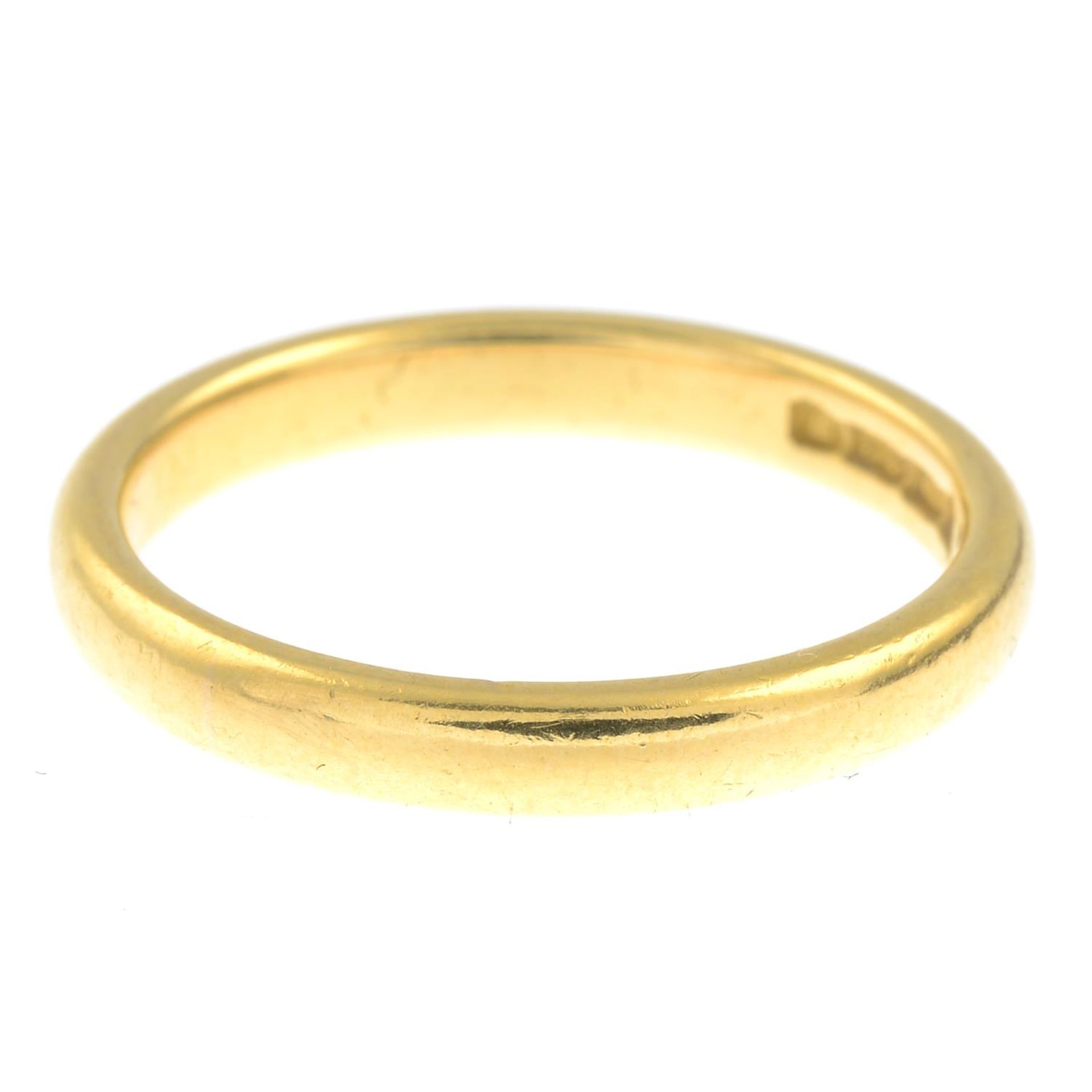 A mid 20th century 22ct gold band ring.Hallmarks for London, 1954.Ring size M.
