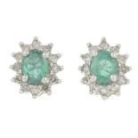 A pair of emerald and diamond cluster earrings.Estimated total diamond weight 0.25ct.Length 0.8cm.