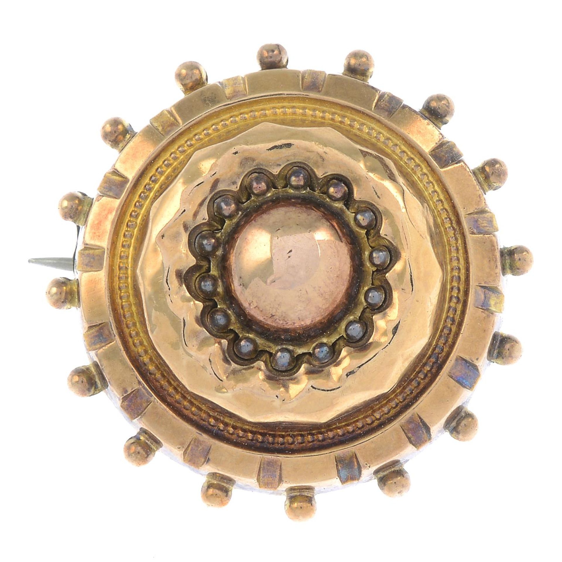 A late 19th century gold circular brooch.