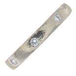 An 18ct gold brilliant-cut diamond ring.Estimated total diamond weight 0.20ct,