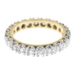 A brilliant-cut diamond full eternity ring.Estimated total diamond weight 0.90ct,