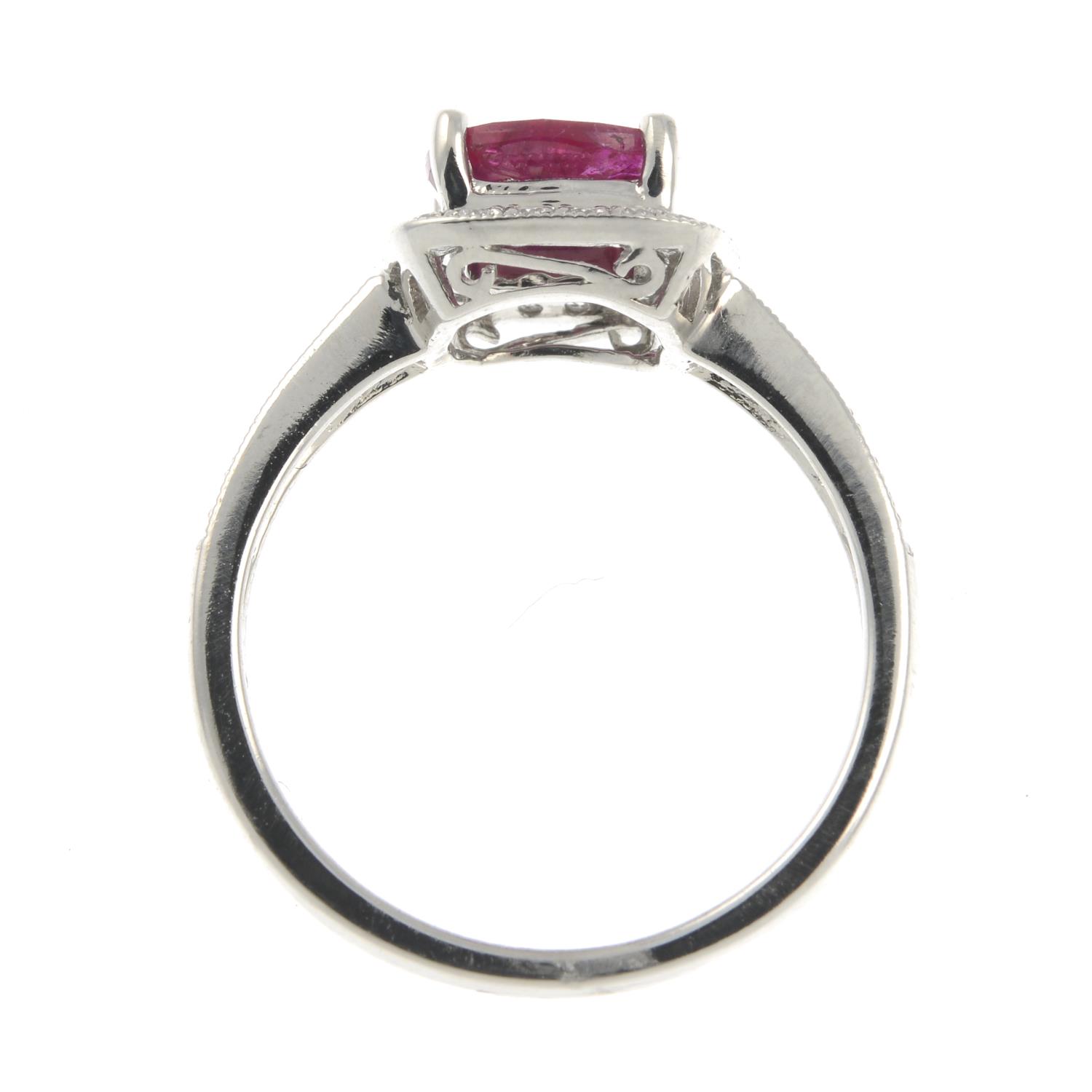 A ruby and brilliant-cut diamond cluster ring.Ruby weight 1.63cts.Diamond weight 0.29ct.Stamped - Image 2 of 3