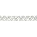 An 18ct gold brilliant-cut diamond bracelet.Total diamond weight 2.50cts,