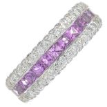 An 18ct gold pink sapphire half eternity ring, with pave-set diamond sides.