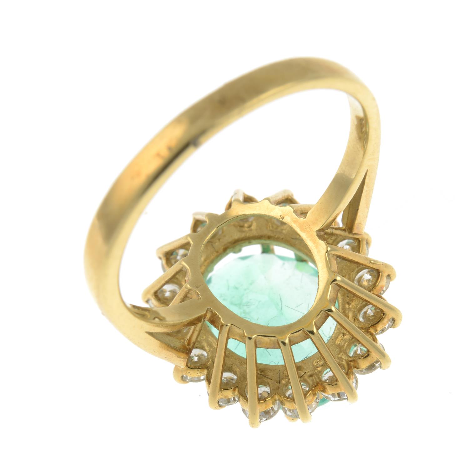 An 18ct gold emerald and brilliant-cut diamond cluster ring.Emerald calculated weight 2.88cts, - Image 3 of 3