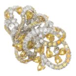 An 18ct gold brilliant-cut diamond and yellow sapphire 'Storm' ring.Total diamond weight 2.64cts,