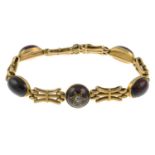 A bracelet, with garnet cabochons,