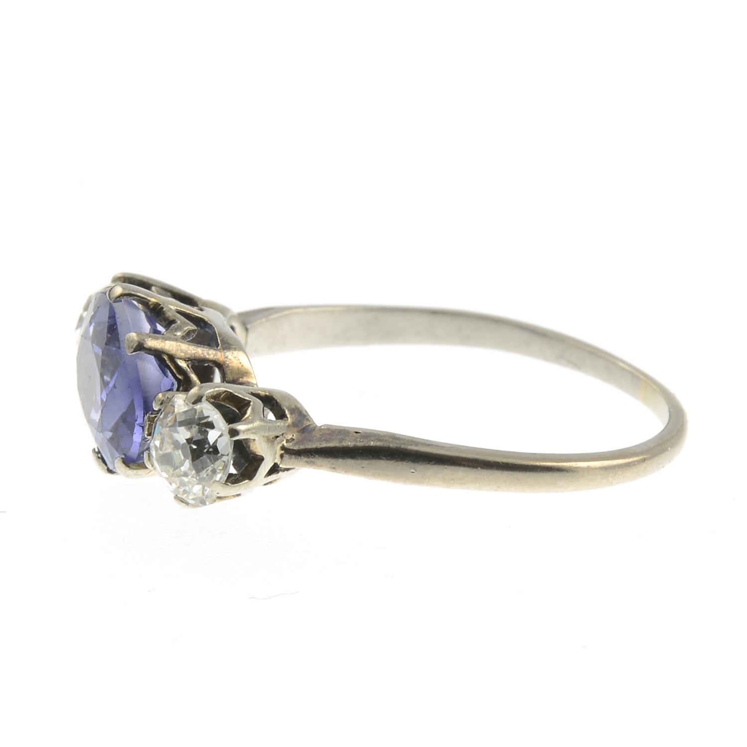 A sapphire and old-cut diamond three stone ring.Sapphire calculated weight 2.30cts, - Image 3 of 3