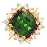 An 18ct gold green tourmaline and brilliant-cut diamond cluster ring.Tourmaline calculated weight