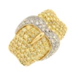 A pave-set 'yellow' diamond and diamond buckle ring.Estimated total diamond weight 1.75cts.Stamped