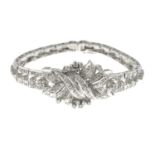 A circular-cut diamond bracelet.Estimated total diamond weight 1.85cts,