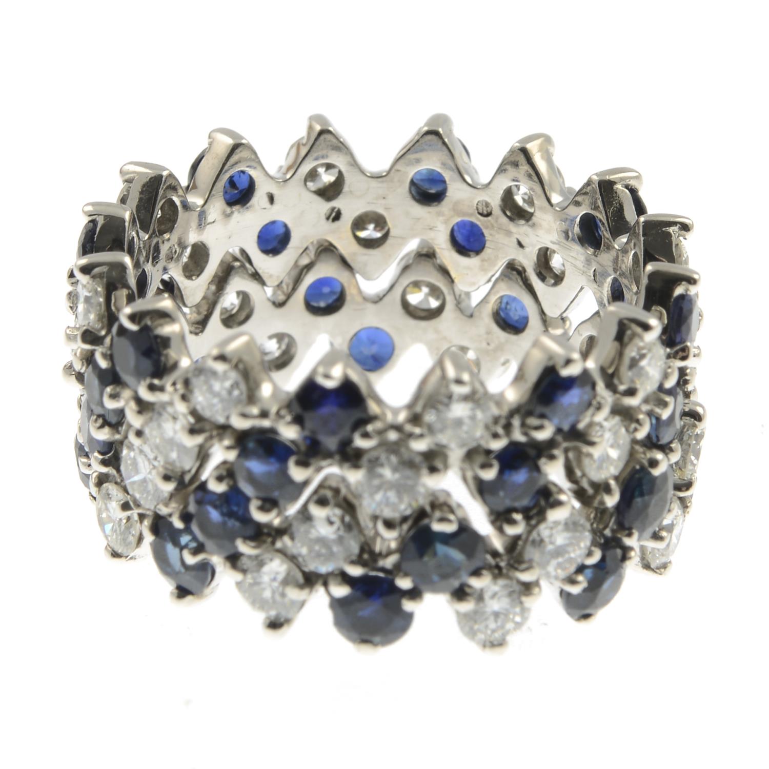 A sapphire and diamond band ring.Estimated total diamond weight 1.40cts, - Image 3 of 3