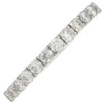 A brilliant-cut diamond half eternity ring.Estimated total diamond weight 0.65ct.