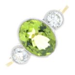 A peridot and brilliant-cut diamond three stone ring.Peridot calculated weight 1.72cts,