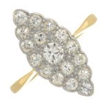 An early 20th century 18ct gold old-cut diamond cluster ring.Estimated total diamond weight 0.65ct,