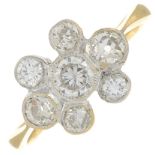 A mid 20th century gold circular-cut diamond cluster ring.