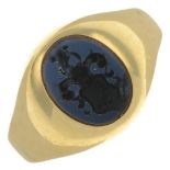 An onyx armorial intaglio ring.French re-strike marks, stamped 750.