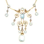 An early 20th century 15ct gold aquamarine and split pearl necklace.Principal aquamarine calculated