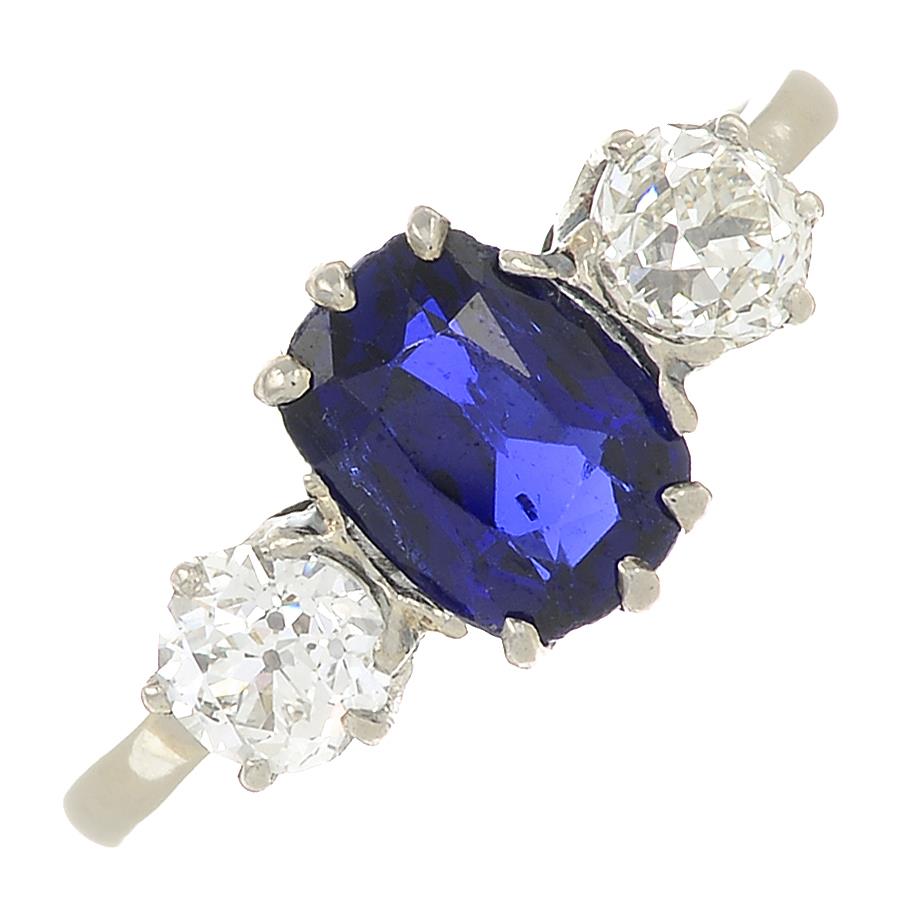 A Sri Lankan sapphire and old-cut diamond three-stone ring.With report 18499,