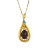 A late Victorian gold garnet and turquoise pendant, suspended from a trace-link chain.