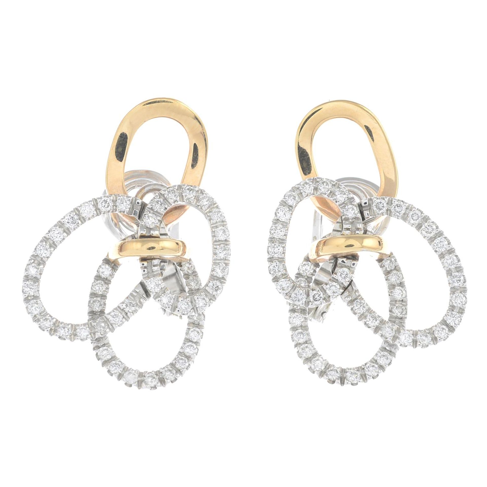 A pair of 18ct gold brilliant-cut diamond earrings.Estimated total diamond weight 1.10cts.Hallmarks