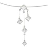 A diamond triple drop pendant,