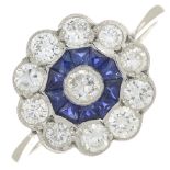 A sapphire and brilliant-cut diamond cluster ring.Estimated total diamond weight 0.75ct,