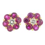 A pair of 18ct gold ruby and brilliant-cut diamond floral cluster earrings.Estimated total diamond