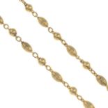 A 9ct gold grooved and polished bead necklace.Import marks for London, 1995.