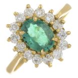 An 18ct gold emerald and brilliant-cut diamond cluster ring.Emerald calculated weight 1.02cts,