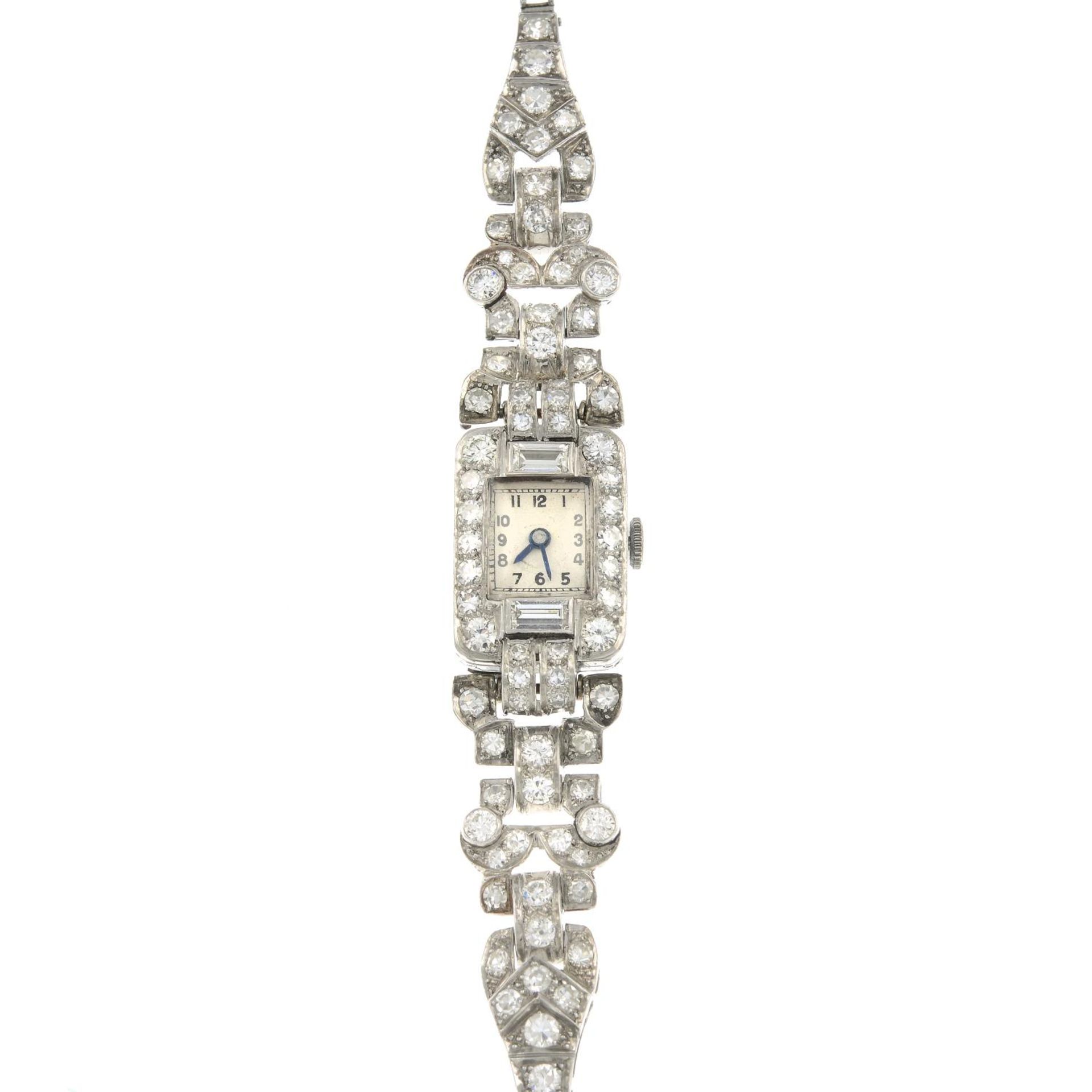 A mid 20th century platinum vari-cut diamond cocktail watch.Estimated total diamond weight 4.20cts,