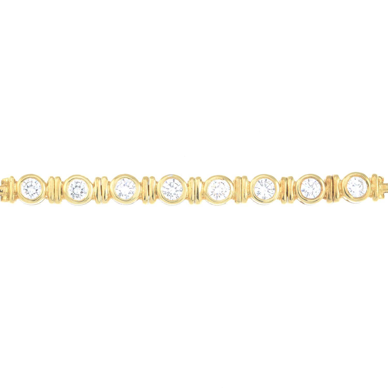 A brilliant-cut diamond bracelet.Estimated total diamond weight 0.80ct,